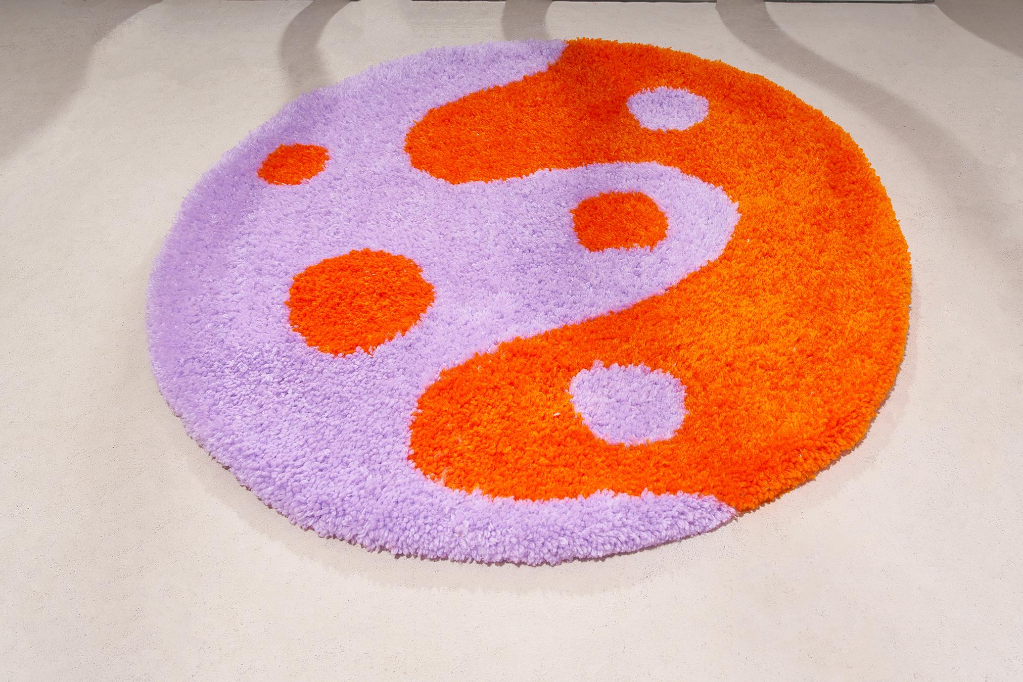 The Yin Yang Dot rug is a modern take on yin yangs & polka dots. The mix is so fun!

I design & hand tuft all of my pieces, it is truly art for your floor. It can also be used as a wall hanging!

Acrylic yarn

Measures: 4 ft x 4