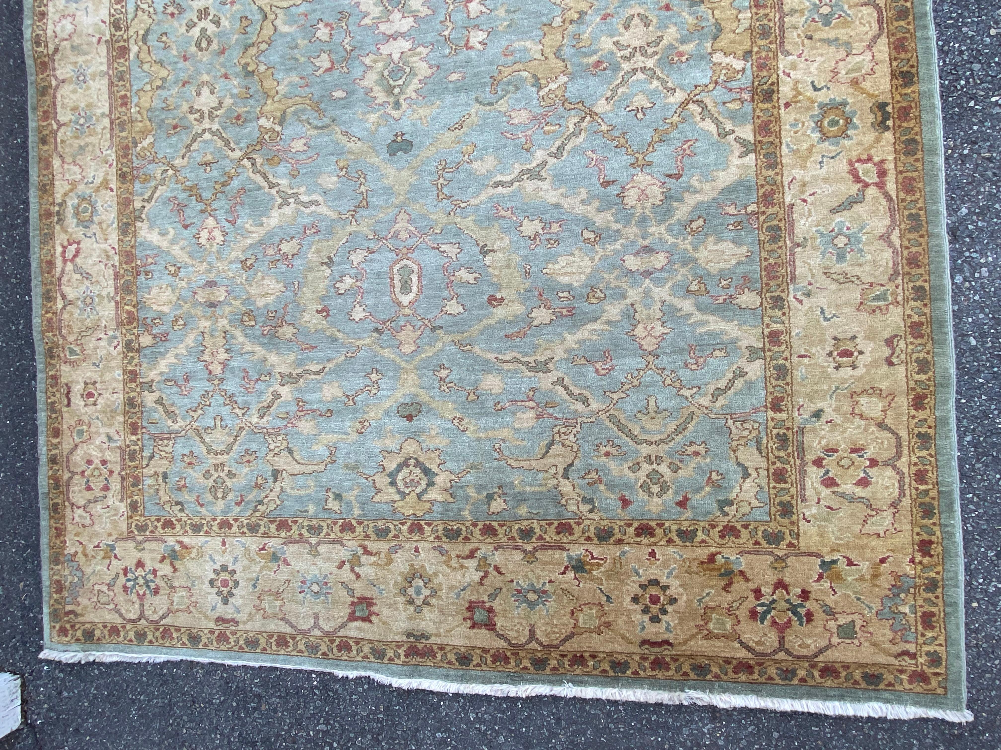 Hand-tufted Sultanabad Persian wool area rug (or wide runner), probably mid-late 20th c. in very good condition, with low, tightly woven pile, and beautiful subdued colors of blue ground, tan boarder, and soft red accents. Pantone colors 15-4703 TPX