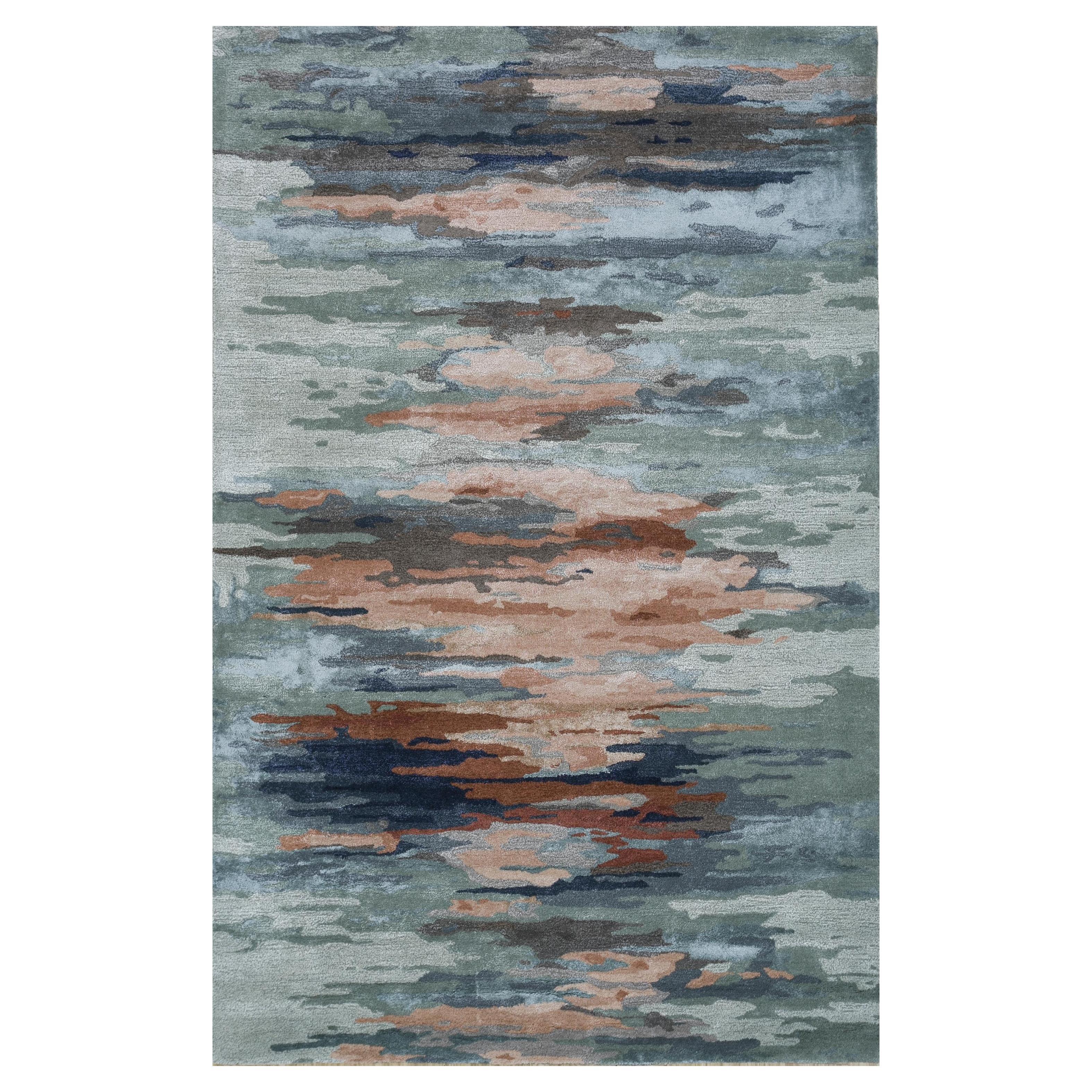 Alfombra de lana y viscosa tejida a mano en tonos plateados, azules y rosas, diseño abstracto