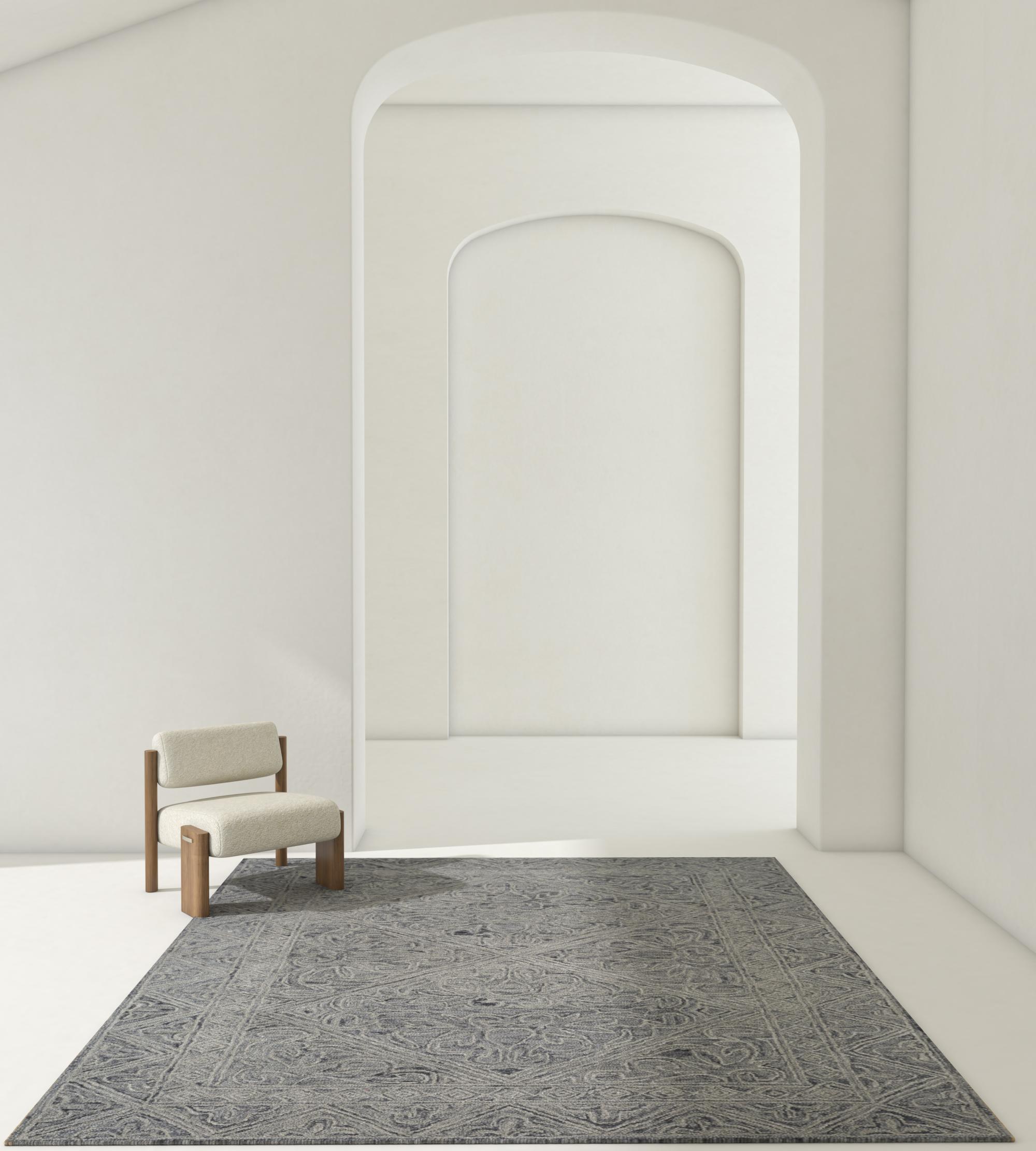 Questo tappeto in lana trapuntata a mano 5' x 8' di Jaipur Rugs è caratterizzato da una sofisticata tavolozza di ardesie ebano e grigio scuro, ideale per dare un tocco di eleganza contemporanea a qualsiasi ambiente. Il suo design astratto mette in