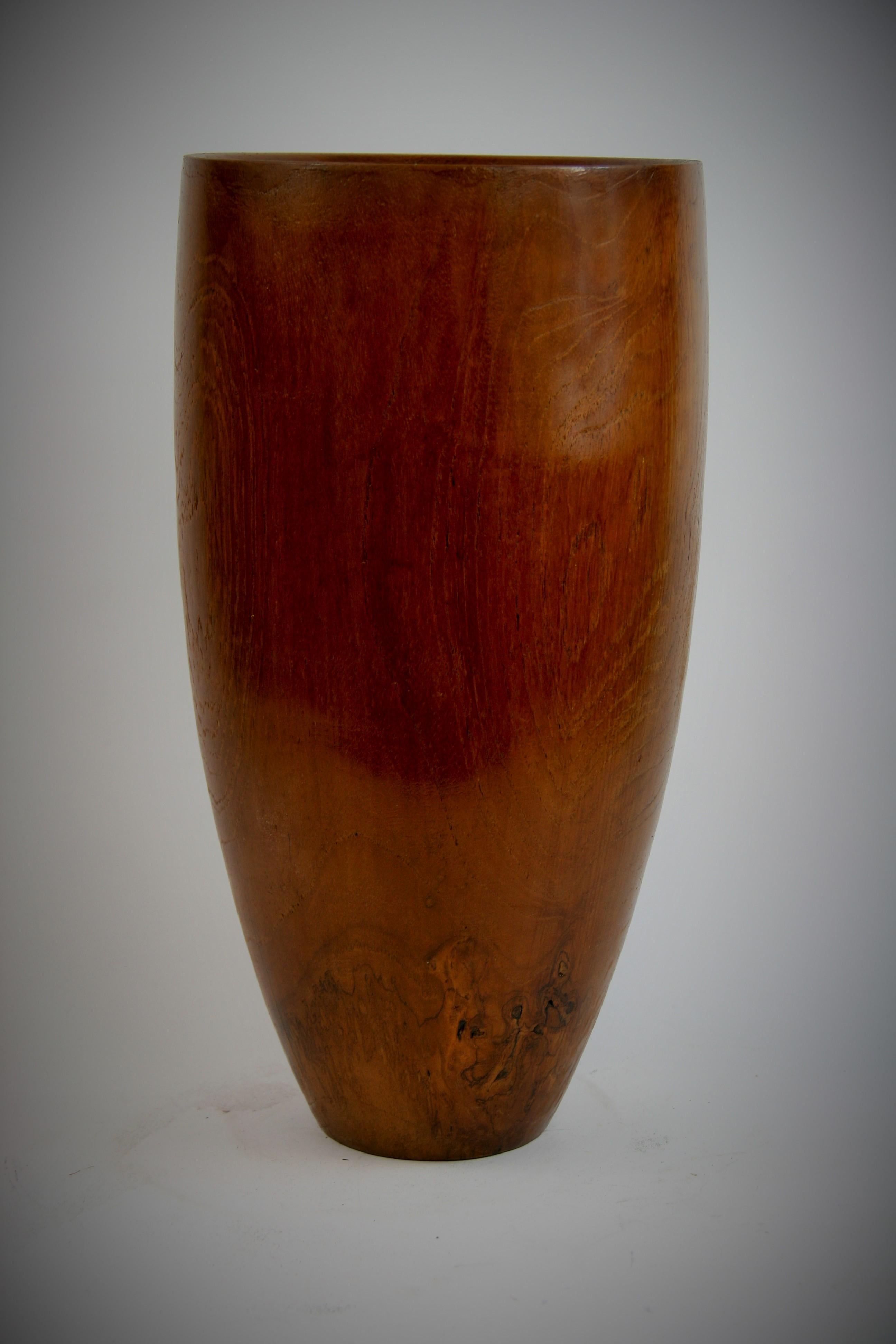 8-285 beautiful hand-turned wood vase from a single block of wood.