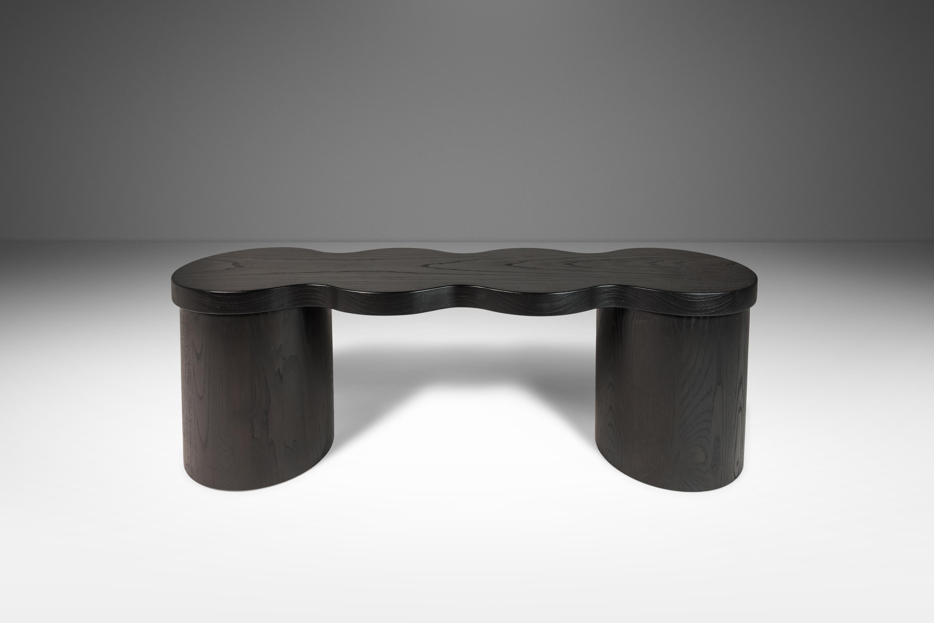 Introduce your home to a touch of organic elegance with this one-of-a-kind, sculptural bench hand-made and hand-turned by Mark LeBlanc. Masterfully crafted from a rare and intentionally sourced piece of 3