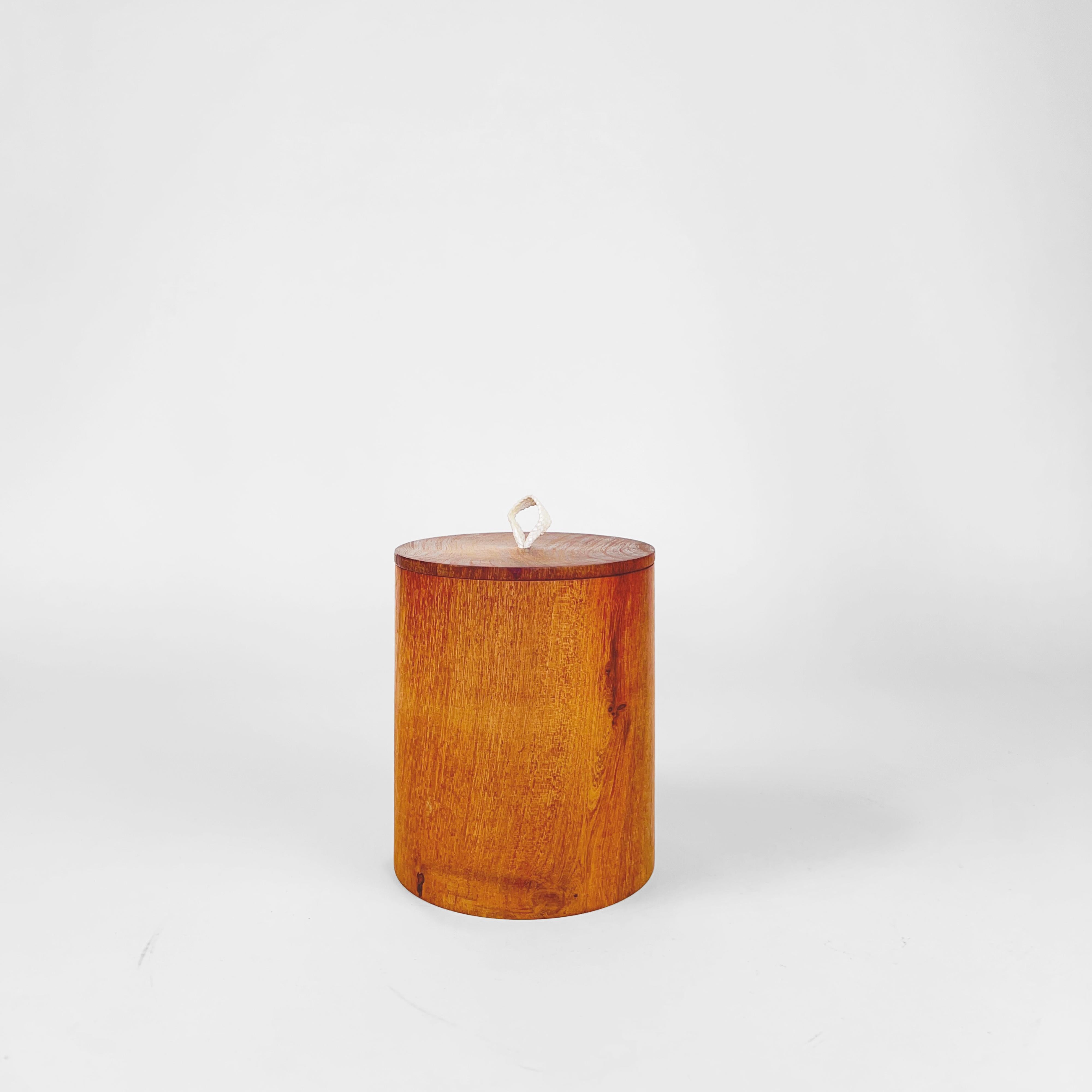 Hand-turned wooden canister by Alta Pampa, Argentina.
The piece is made in Quebracho (Hardwood). The smooth finish reveals the material beautiful grain.
The lazo style pull is made of hand-braided leather.
Stamped on the base.