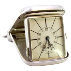 Hand-wound travel clock in guilloche silver on the casing and suspension ring
