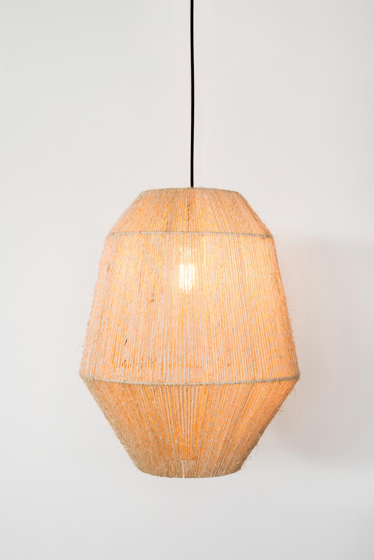 This Handwoven Agave Fiber Sun Light Screen is a unique creation by León León Design from Mexico City.  
Henequén is the name for the Agave fibers used to make this special weaving rope. The same Agave that gives us Tequila and Mezcal. 

The screen