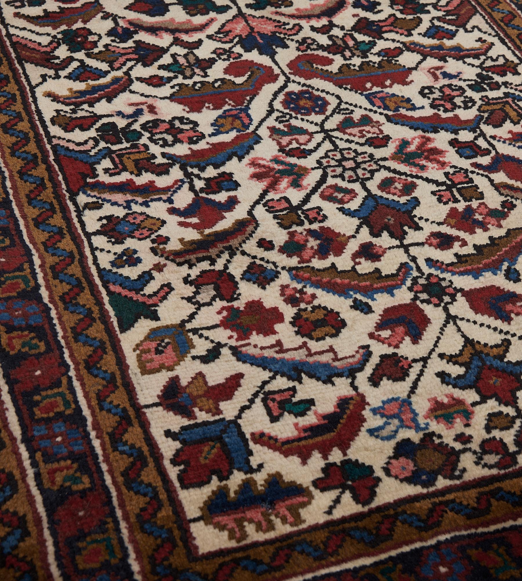 20th Century Hand-Woven Antique Floral Wool Persian Heriz Runner For Sale