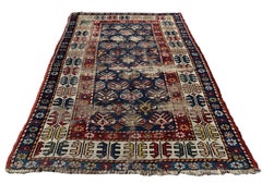 "Hand Woven Antique Rug From The Caucasus. Dated 1306."