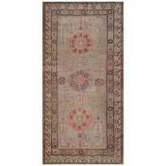 Tapis Khotan en laine antique tissé à la main