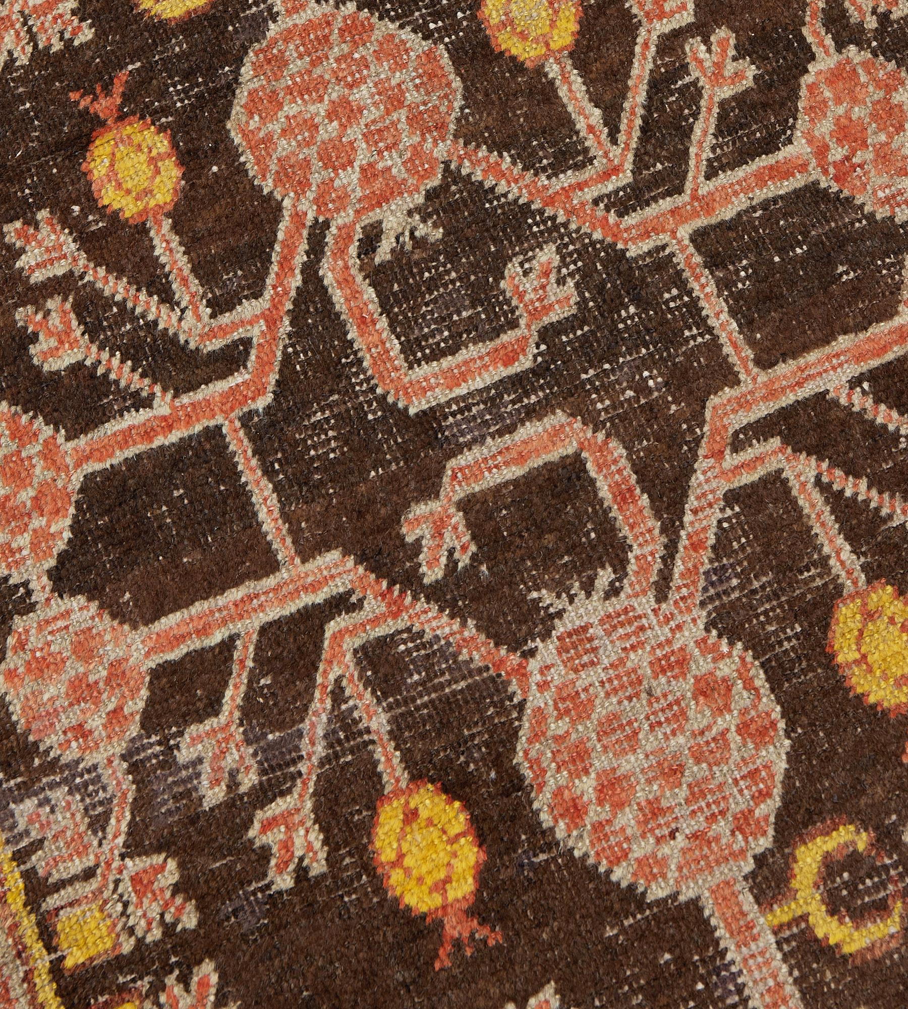 East Turkestani Hand-woven Brown Wool Antique Pomegranate Khotan Runner For Sale