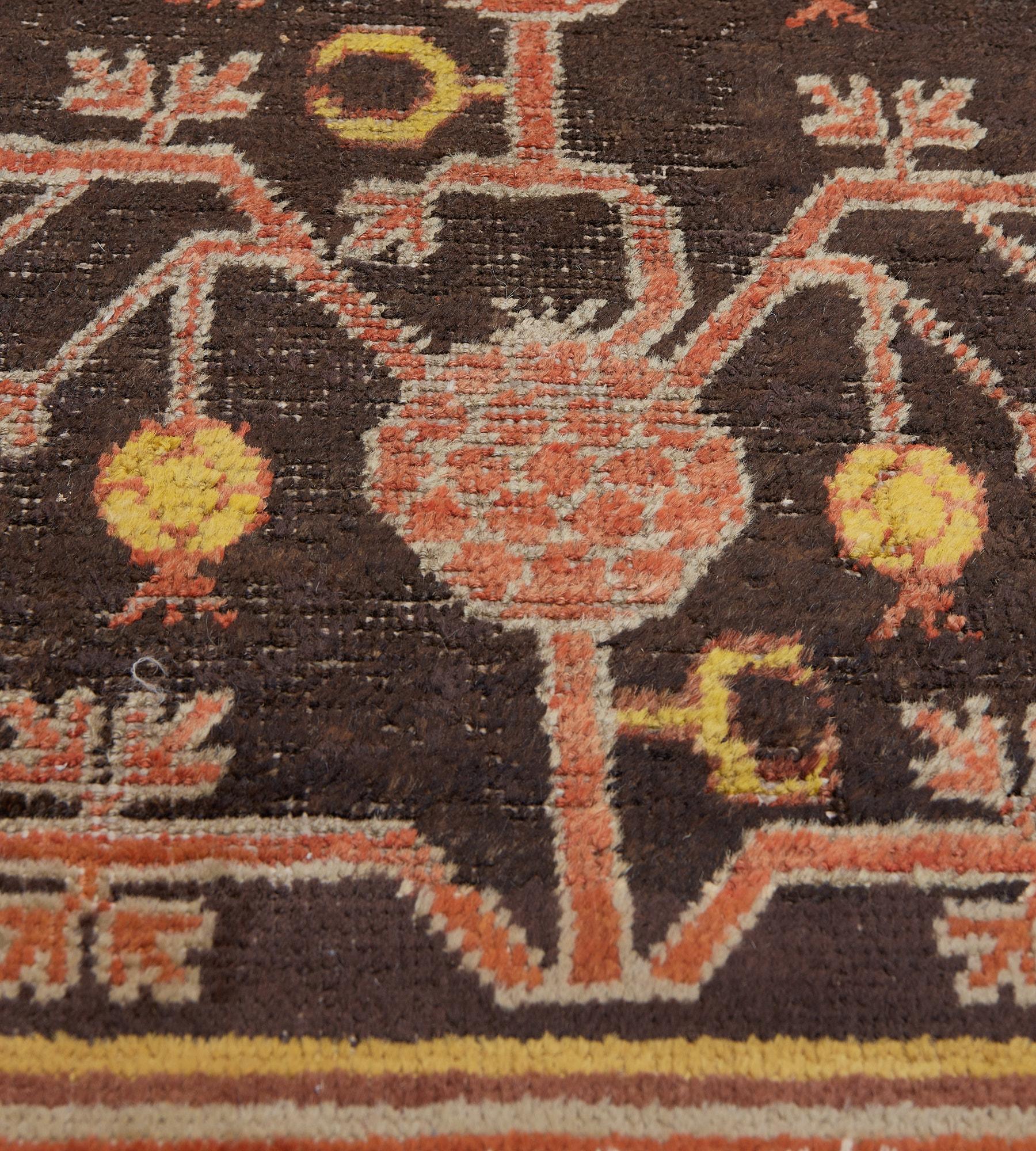 20th Century Hand-woven Brown Wool Antique Pomegranate Khotan Runner For Sale
