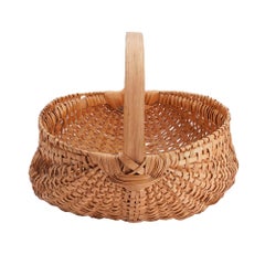 Hand woven buttock basket, 1900's