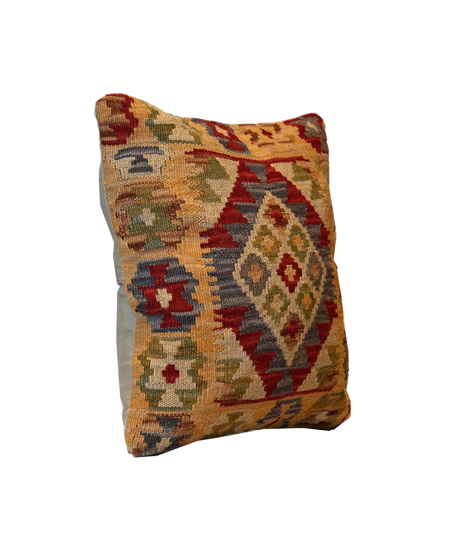 This traditional Kilim cushion cover has been handwoven with the traditional Kilim flat-weave technique. Featuring a geometric pattern woven in beige, cream, blue and red. Decorate your bed, sofa or armchair with this fantastic piece as a scatter