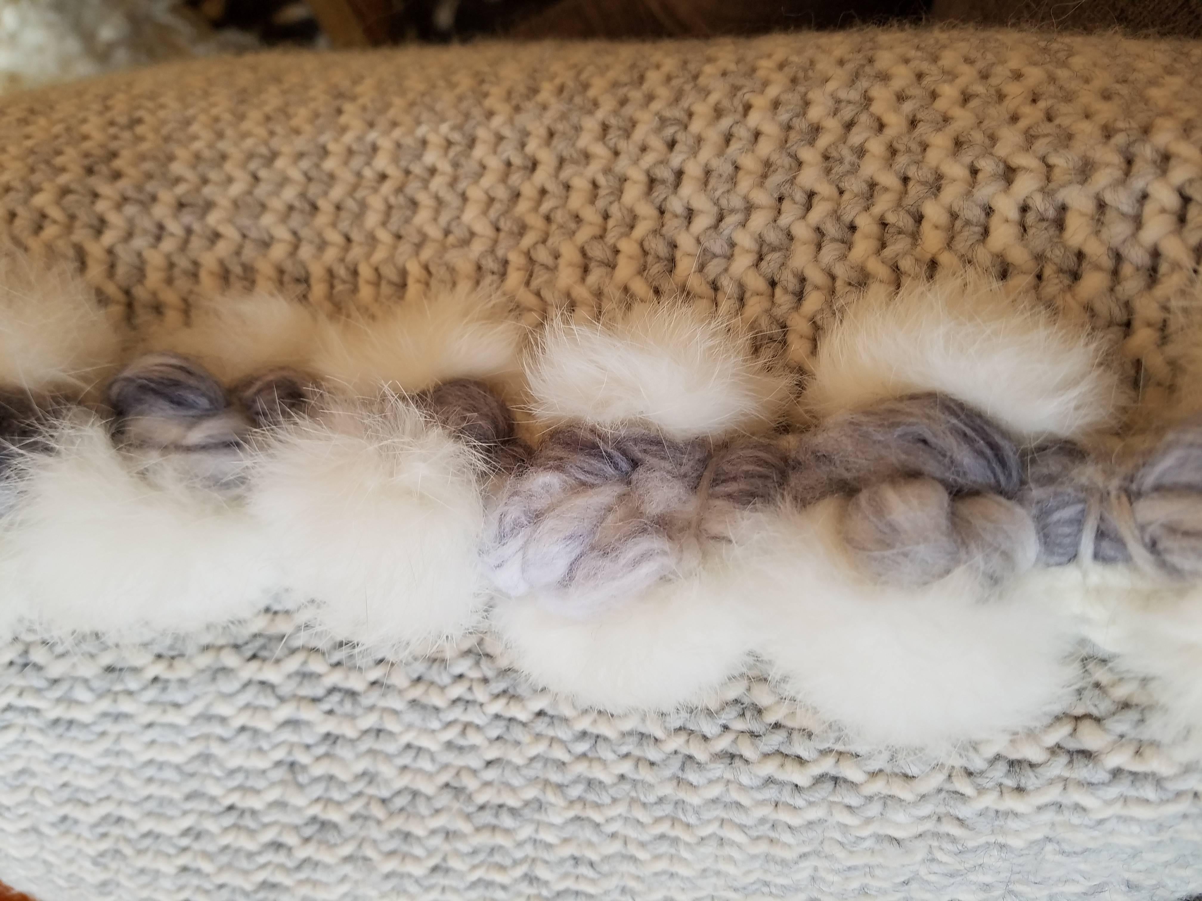 Handwoven Merino Wool Pillow with Angora Trim by Le Lampade
Wonderfully soft Merino wool handwoven and trimmed with hand tufted angora.
Feather and down inserts with hidden zippers. 
Made in Italy.