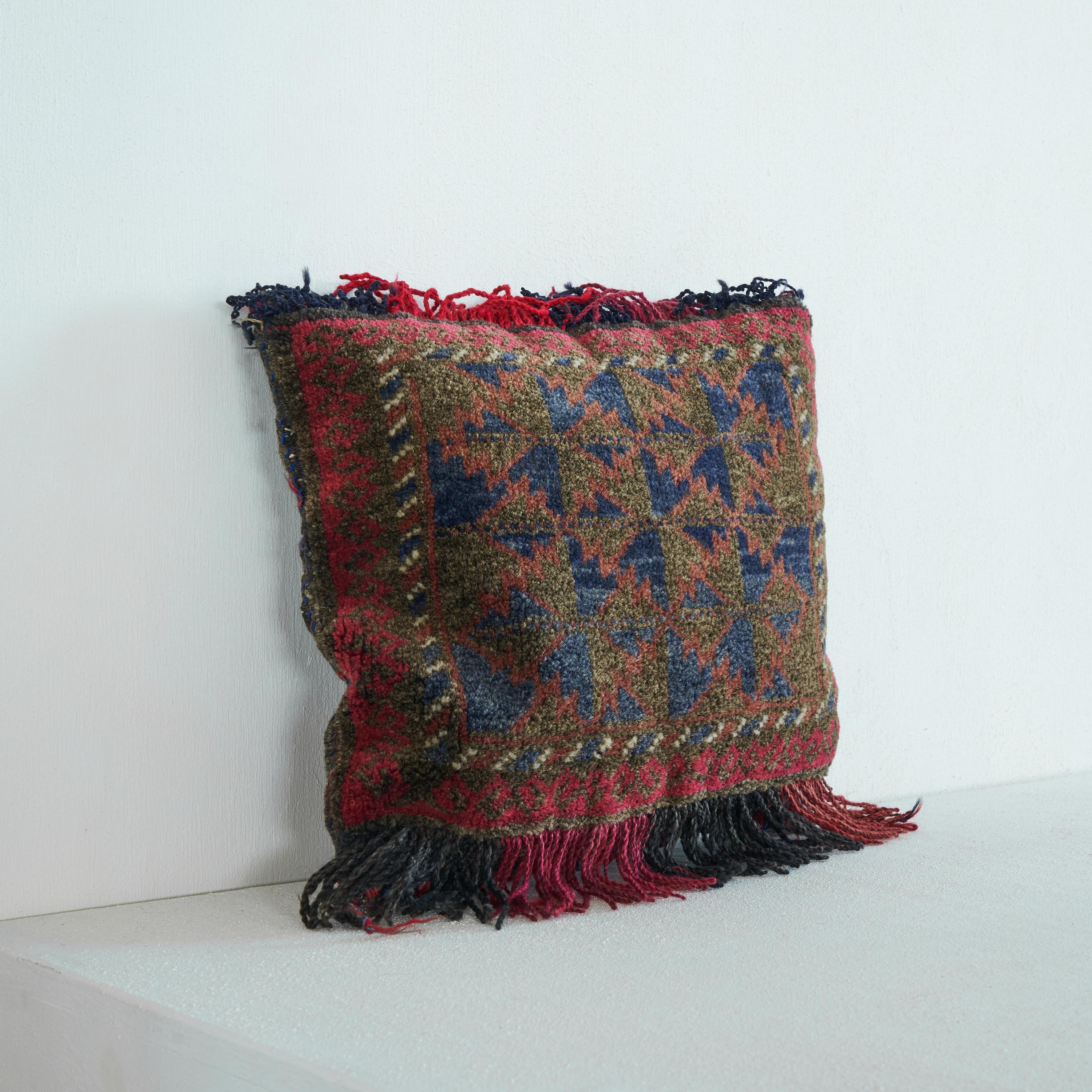 Hand Woven Persian pillow with Geometrical Decor 1930s

Soft and elegant hand woven pillow from the first half of the 20th century with a stylish geometrical decor and interesting colors. Opposed to what you will find most of the times these days,