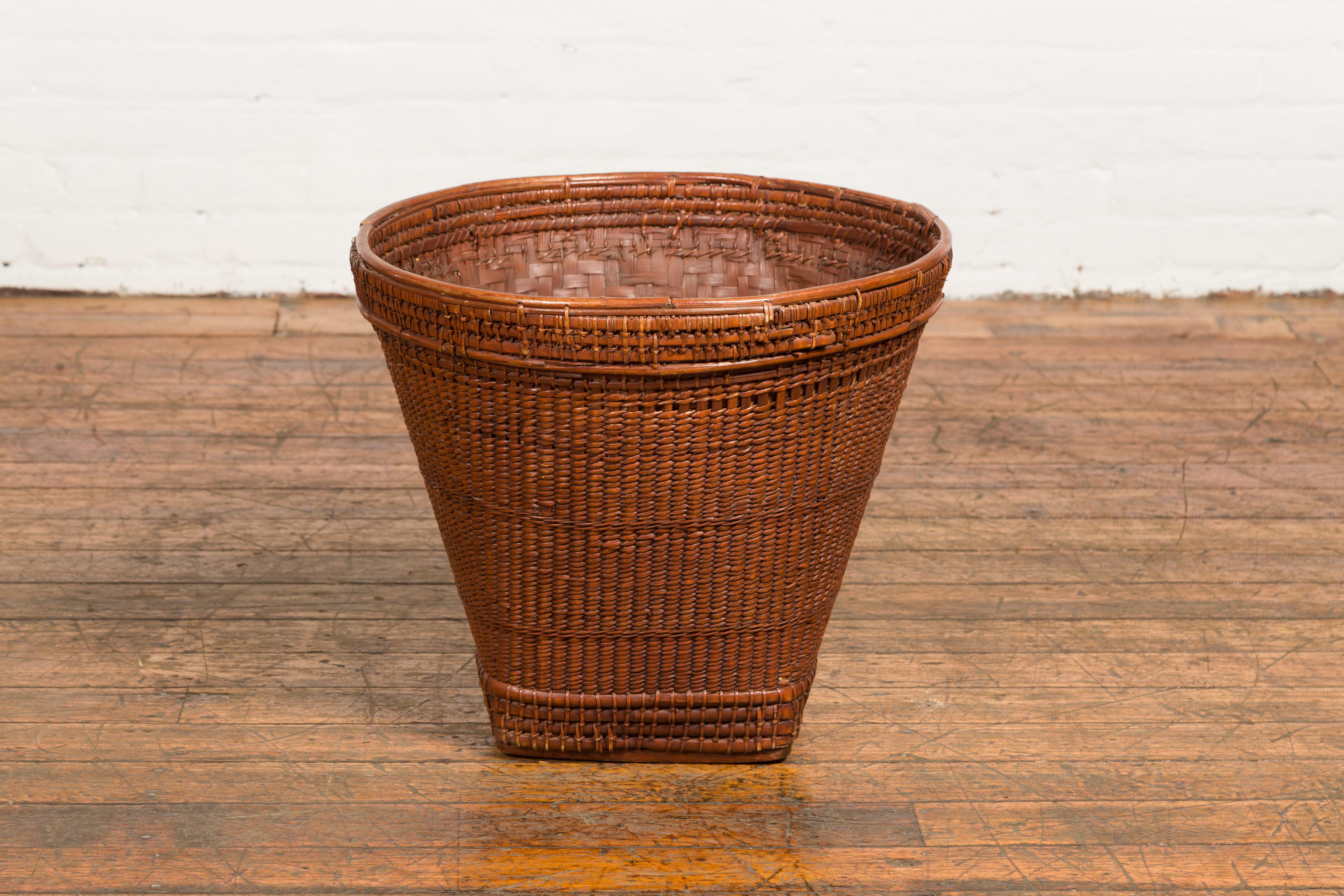 Hand-Woven Hand Woven Rattan and Bamboo Thai 19th Century Grain Basket with Tapering Lines For Sale