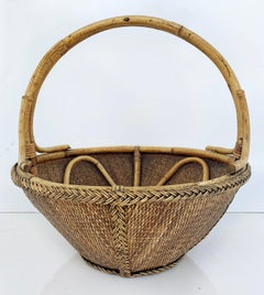 Hand-Woven Rattan and Reed Basket with Handle and Braided Border