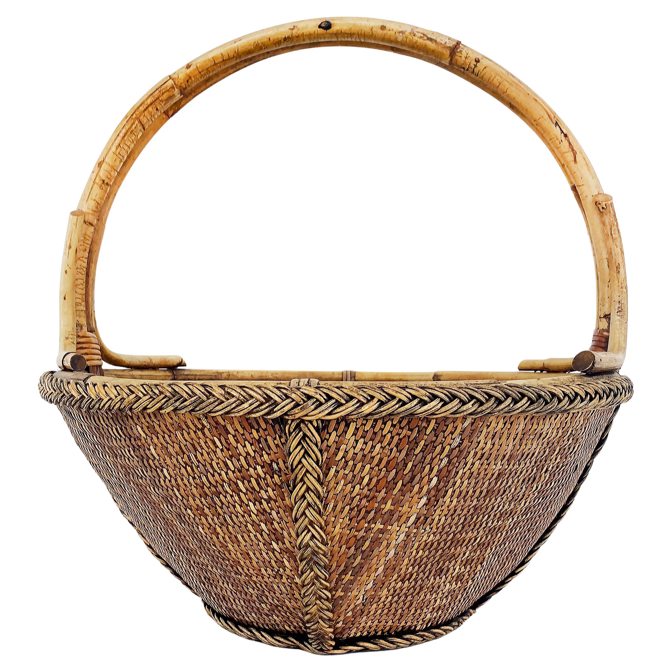 Hand-Woven Rattan and Reed Basket with Handle and Braided Border For Sale