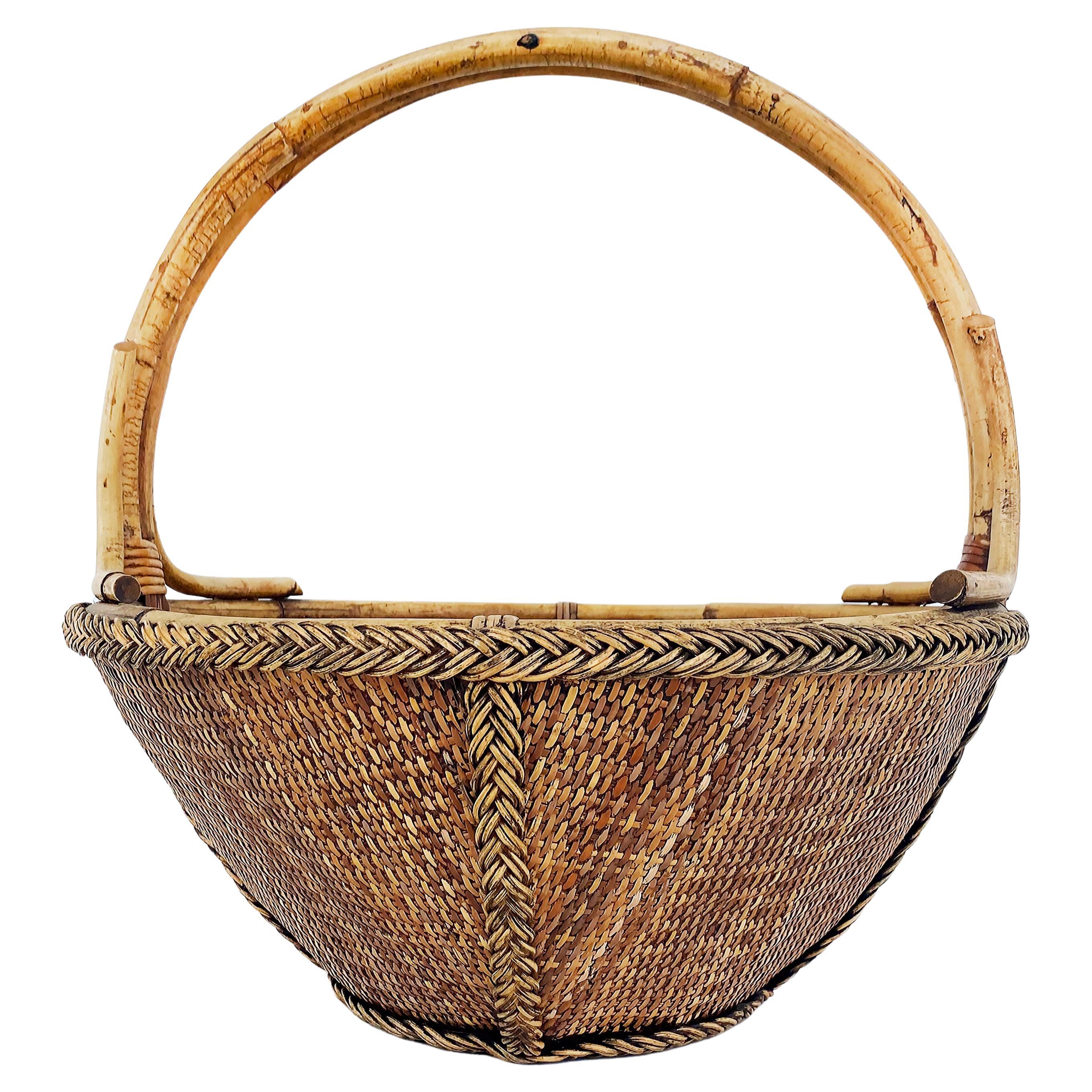 Hand-Woven Rattan and Reed Basket with Handle and Braided Border