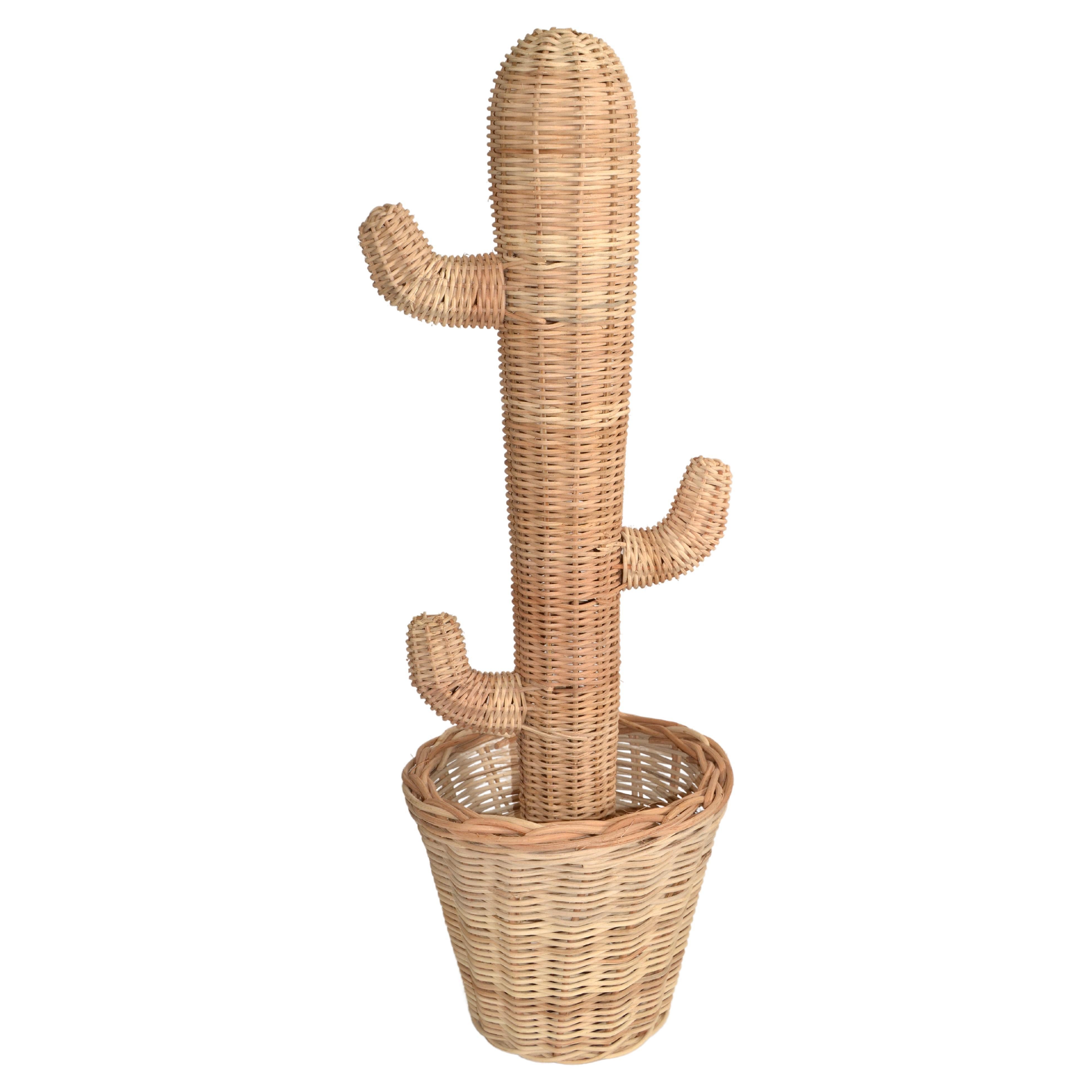 Mario Lopez Torres Style Mid-Century Modern hand-woven Rattan, Wicker and Reed Cactus Pot Sculpture.
Bohemian Style made in America in the late 20th Century.
All original condition with some breaks at the Stem due to age and dryness.