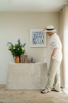hand-woven rattan scalloped console table