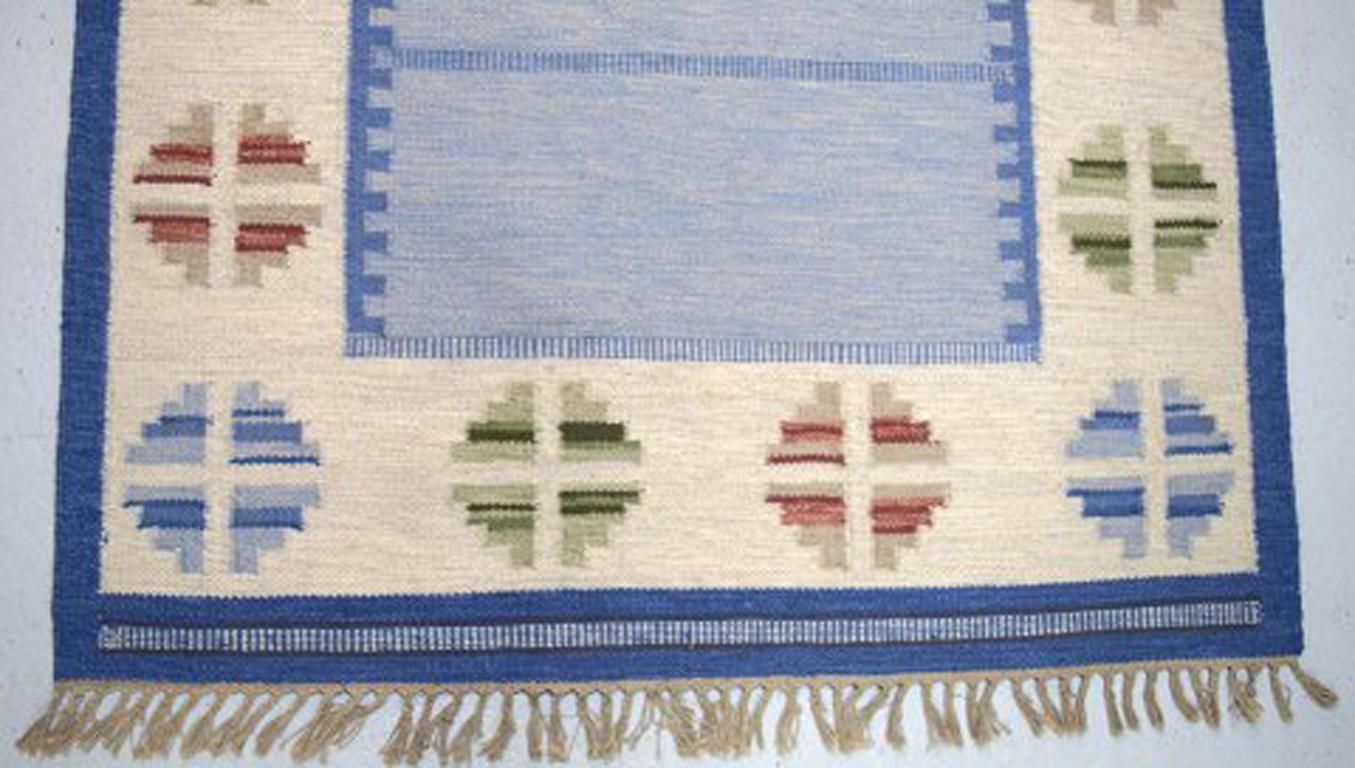 Handwoven rug / carpet of wool in 