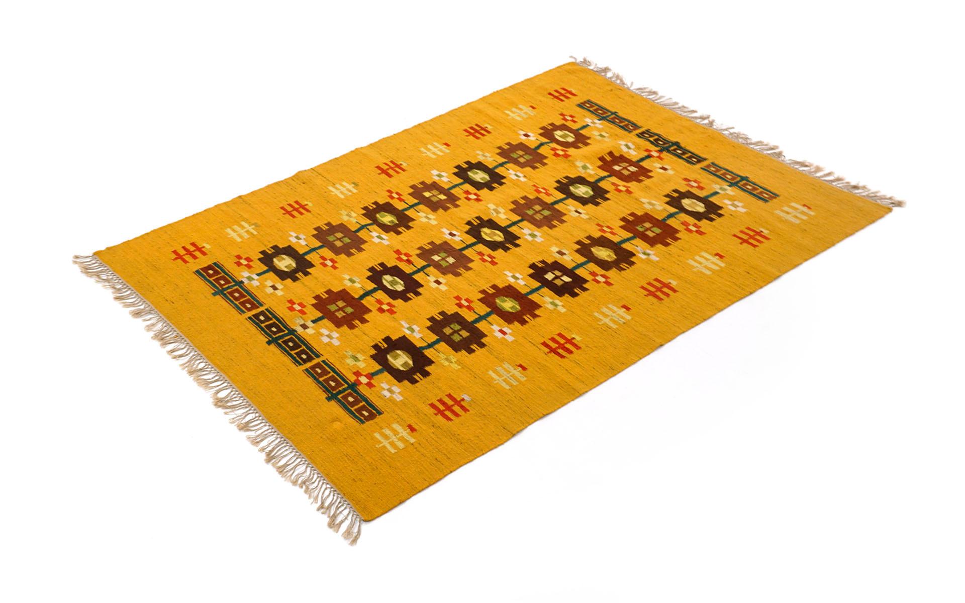 Handwoven tapestry / rug designed by Rumiany Sznajder for Cepelia, Poland, 1970s. The condition is excellent with no signs that this has ever been used as a rug. Beautiful colors of yellow, mustard, reds, browns and more.