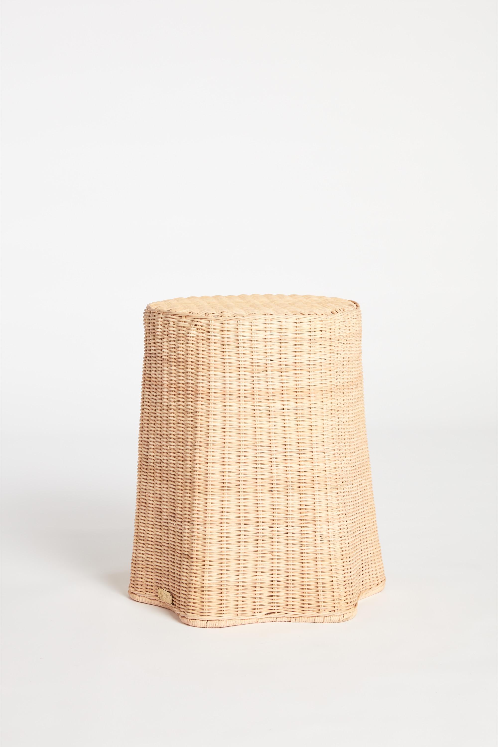 The sustainably made and handwoven side table is designed for the multiple purposes of bedside or lounge side table, and is a light weight-bearing stool (can hold up to 70kgs) serving form and function.

Working from a sturdy powder-coated steel