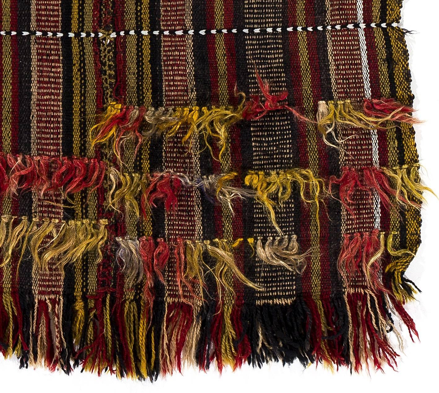 This lively handwoven rug was produced by Kurdish villagers in Central Turkey for daily use in third quarter of the 20th century. Measures: 3.7 x 4.7 Ft.

 These splendid vintage weavings were used in various ways such as wall-hangings, bedding