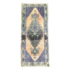 Hand Woven Turkish Purple, Pastel Pink and Peach Rug with geometric detail