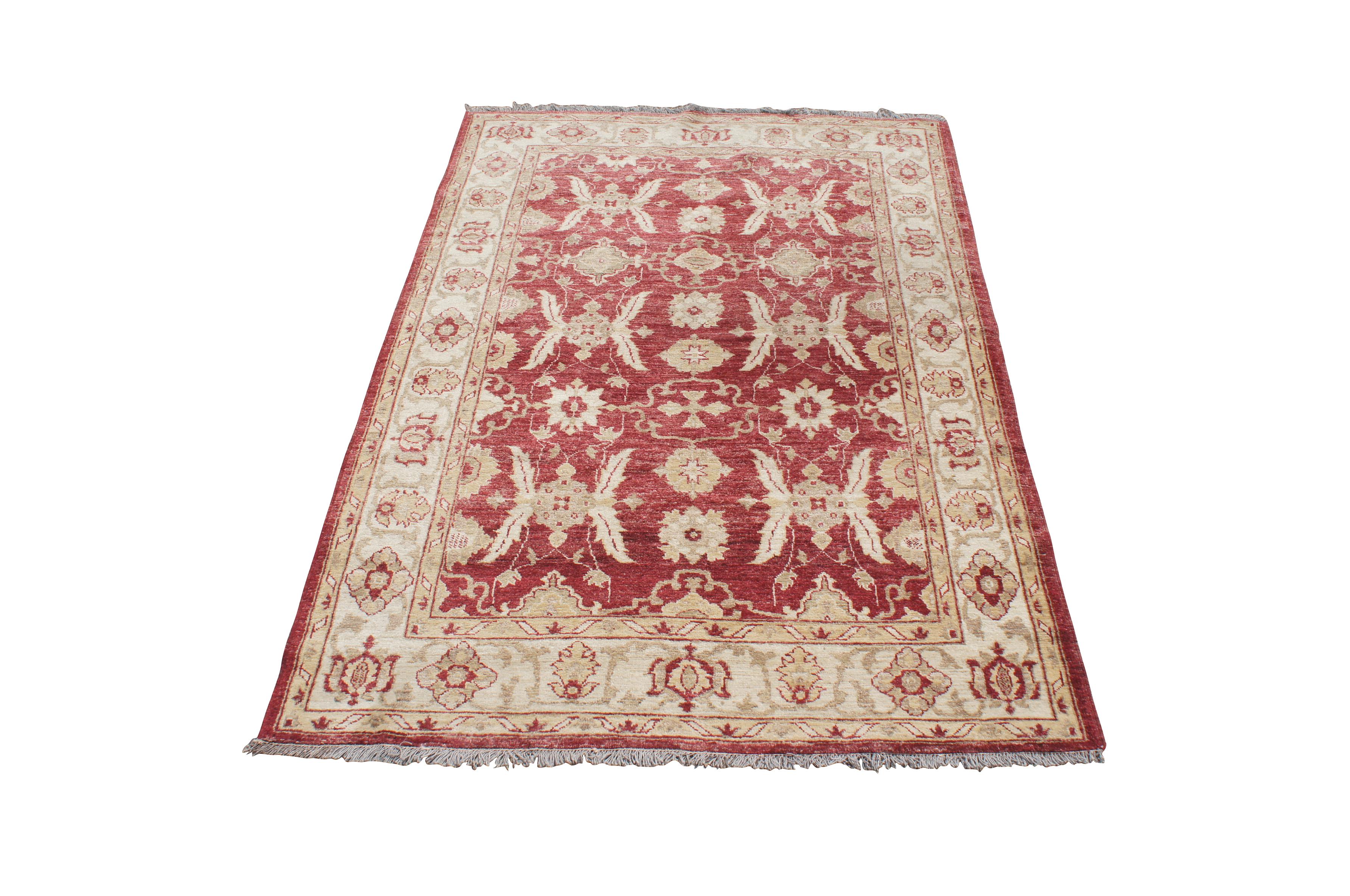 An exceptional floral area rug.  Hand spun with natural dyes in Turkey. Beautifully designed with an eye catching geometric pattern. Features Reds and beiges

Dimensions:
60.5