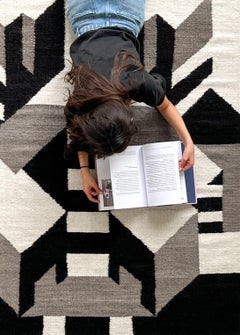 Hand-woven wool rug "Flattened City B" by Maria Sanchez