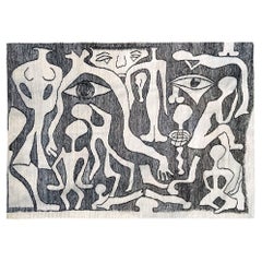 Hand-woven wool rug "Primitive" by Claudia Del Rio