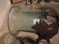 Hand Wrought Iron and Glass Wall Sconce with Foliate Motifs