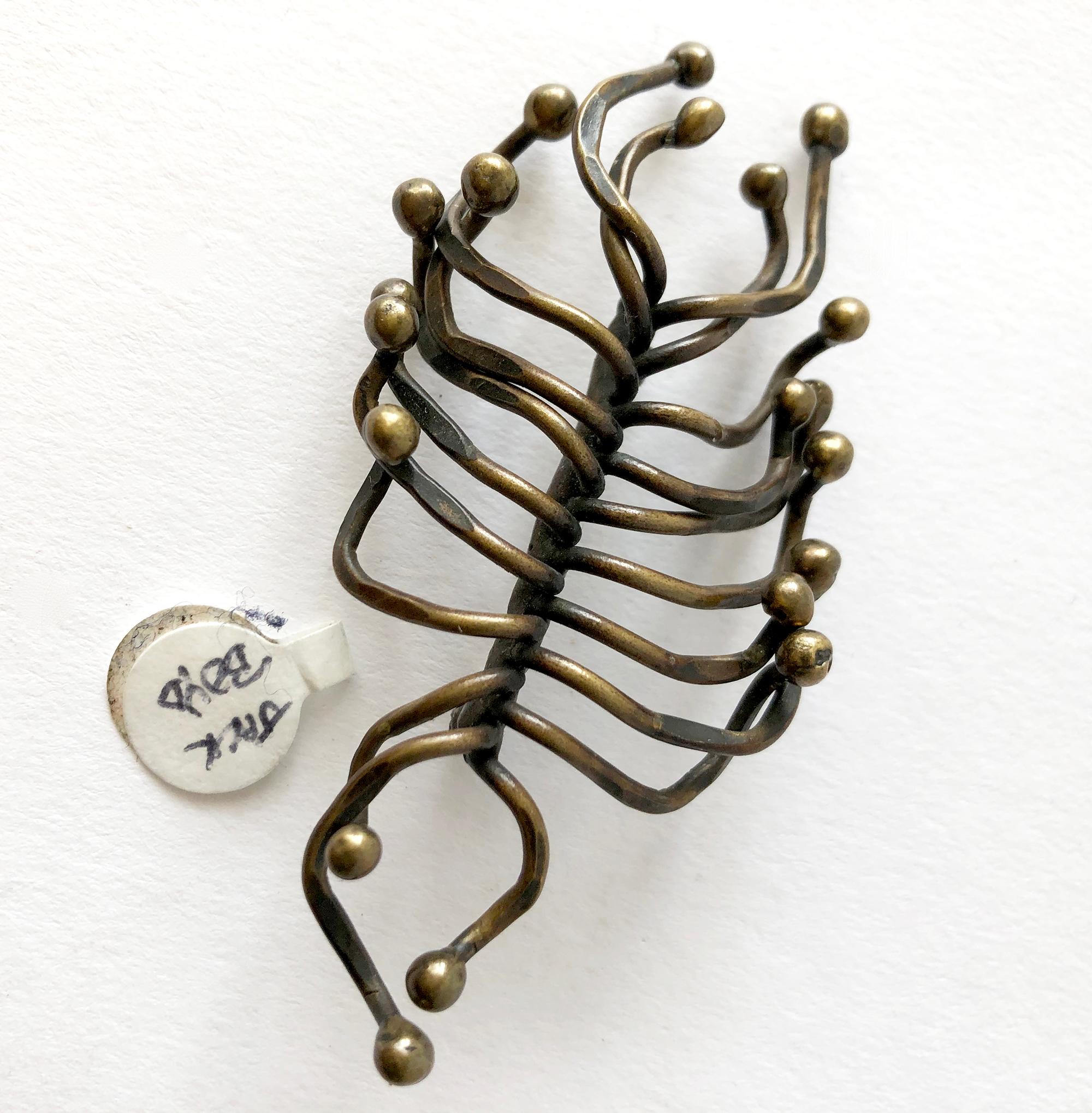 sculptural brooch