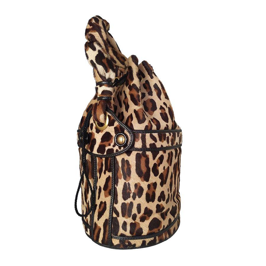 Calf leather Animalier fancy Cylindrical shape Single twisted handle One internal side pocket Interior fabric with FF logo Cm 32 x 19 (1259 x 748 inches) With dustbag Original price euro 1800
