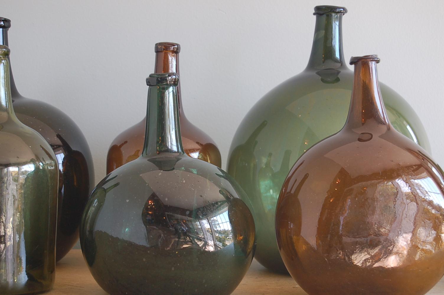 Country Handblown 19th Century Green Glass Bottle with Cork, Origin Sweden, circa 1890