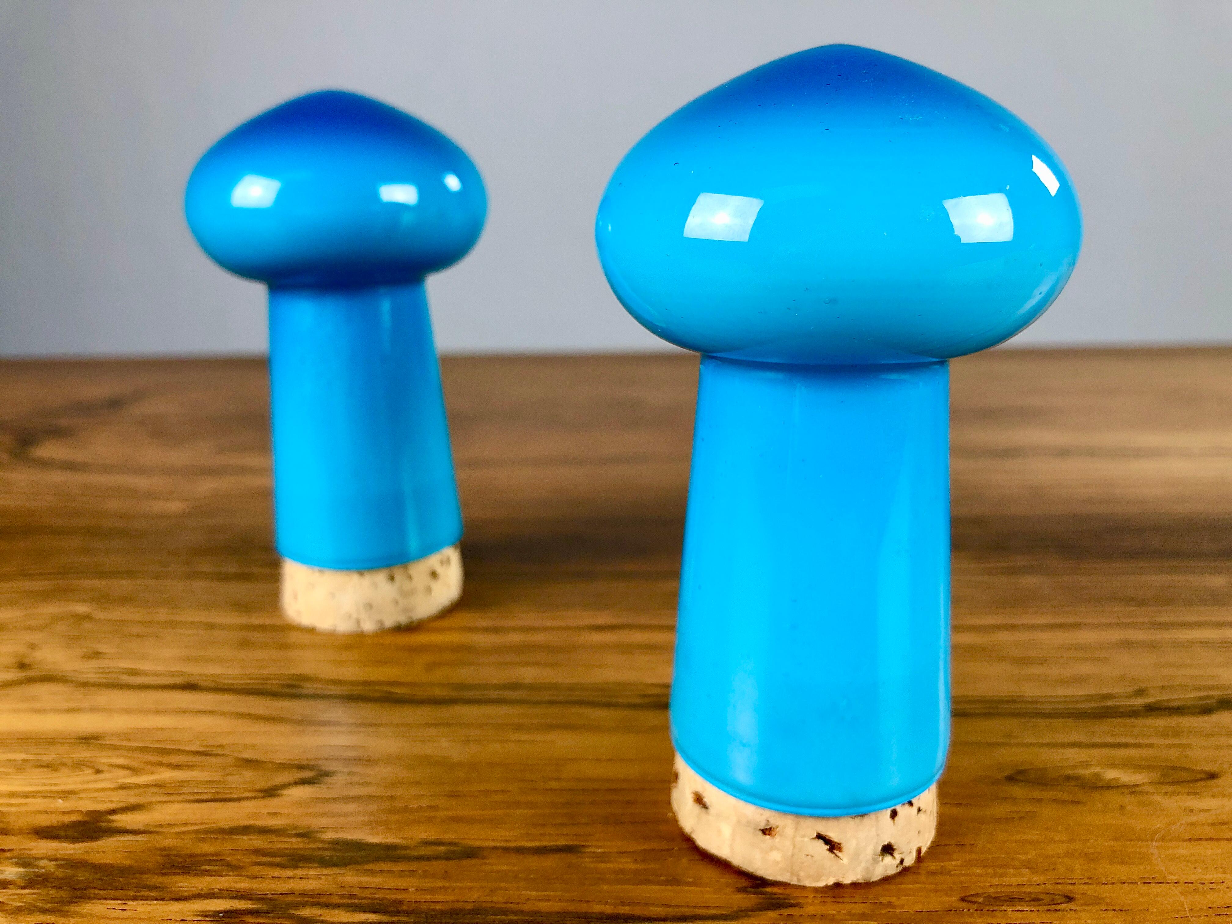 Set of blue Danish salt and pepper set in glass, designed by Michael Bang and produced by Holmegaard in the 1970s.

The well designed hand blown mushroom shaped set in 3 layer opal glass with it´s 1970´s colors is in very good