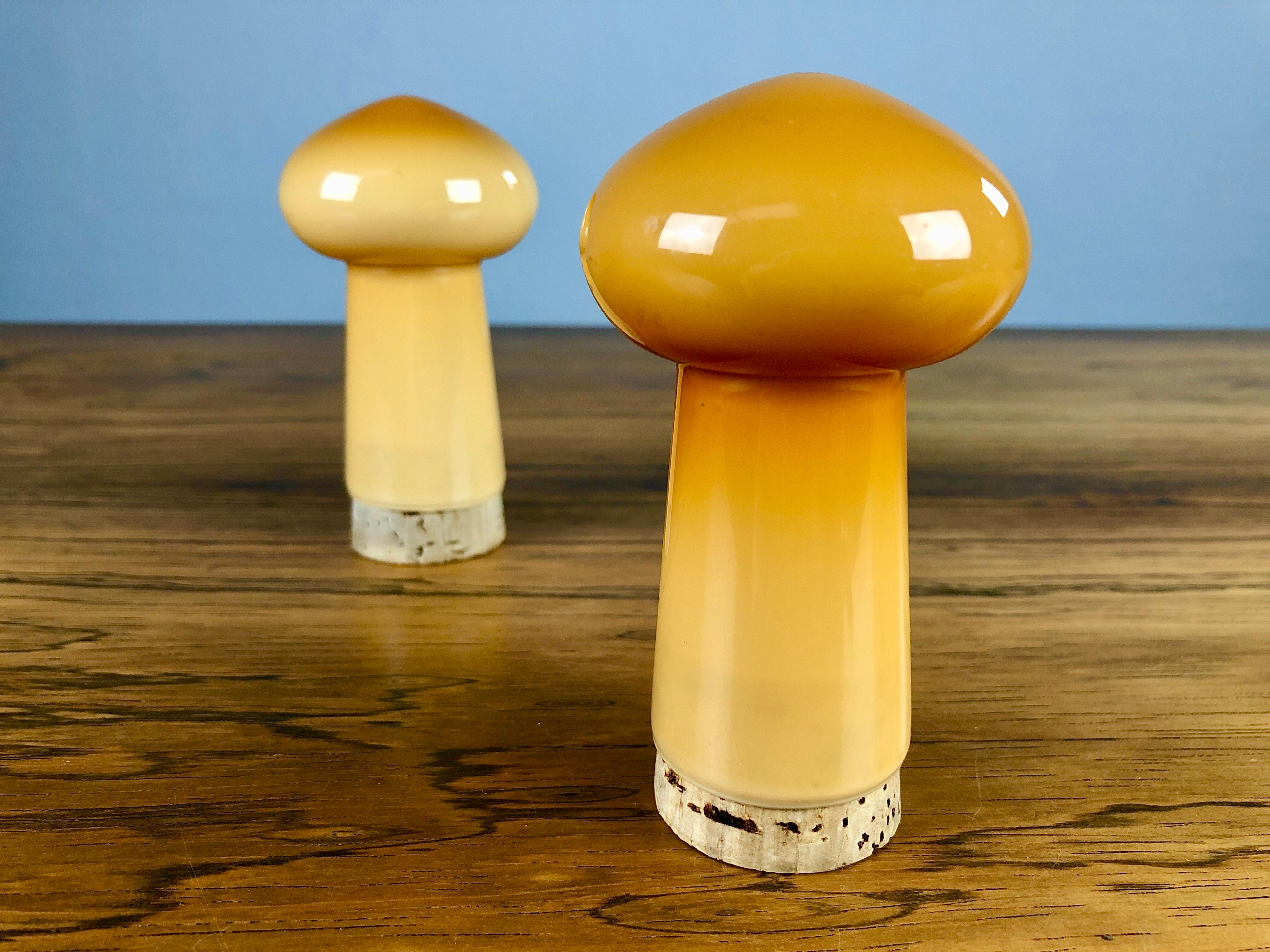 Set of brown Danish salt and pepper set in glass, designed by Michael Bang and produced by Holmegaard in the 1970s.

The well designed hand blown mushroom shaped set in 3 layer opal glass with it´s 1970´s colors is in very good
