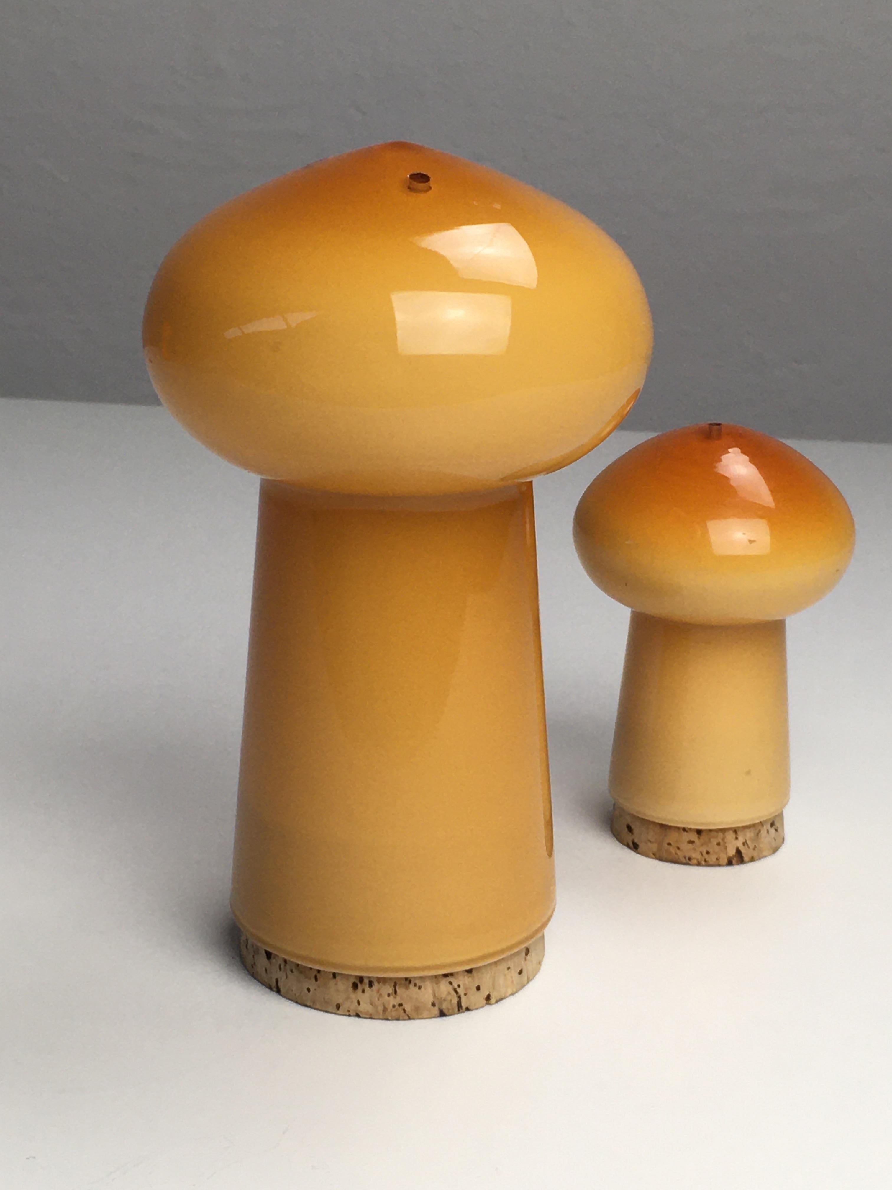 Set of Danish salt and pepper set in handblown brown mushroom shaped opalineglass, designed by Michael Bang and produced by Holmegaard in the 1970s.

The well designed hand blown mushroom shaped set in 3 layer opal glass with it´s 1970´s colors is