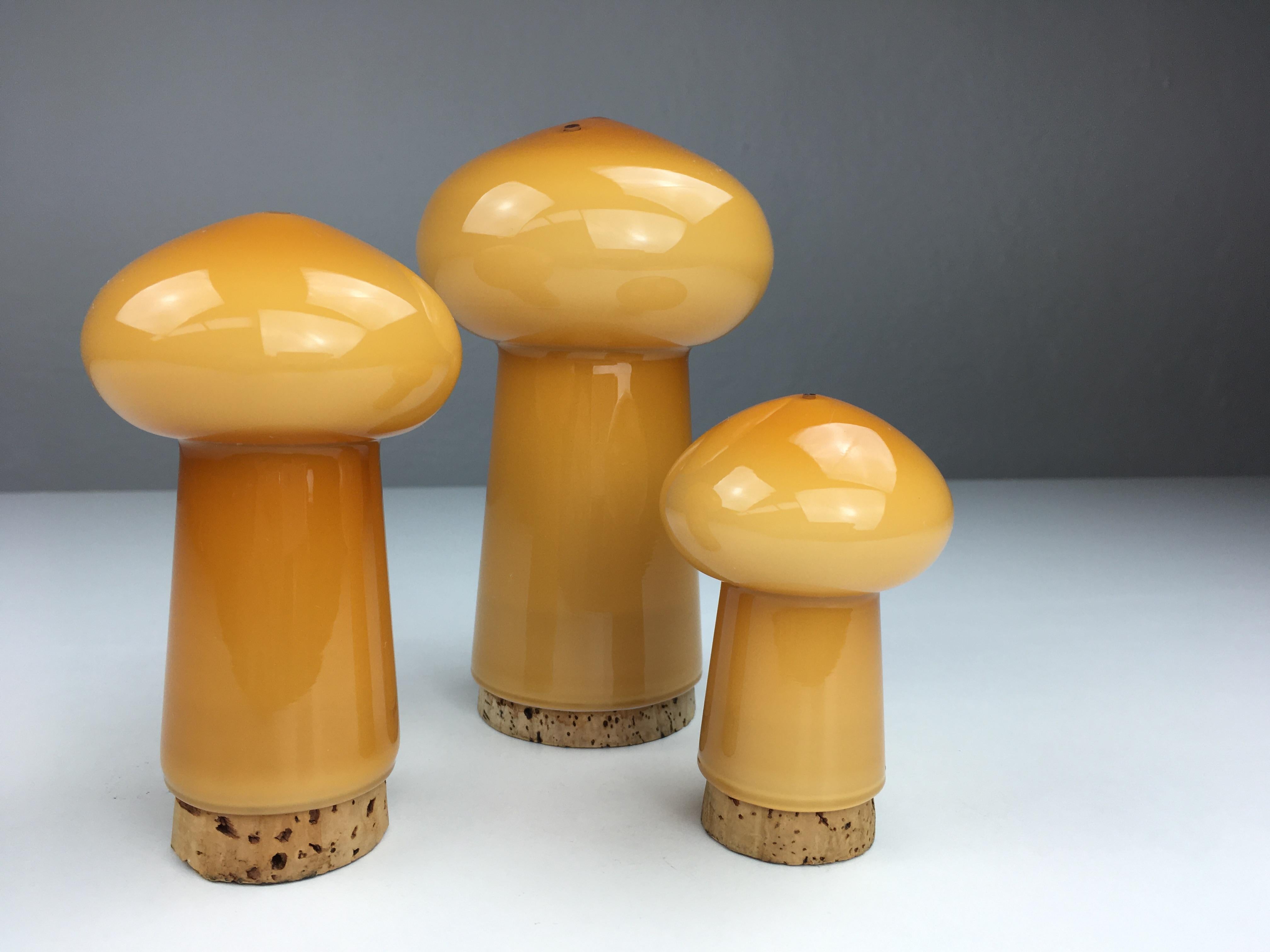 Handblown Danish salt and pepper set in handblown brown mushroom shaped opalineglass, designed by Michael Bang and produced by Holmegaard in the 1970s.

The well designed hand blown mushroom shaped set in 3 layer opal glass with it´s 1970´s colors