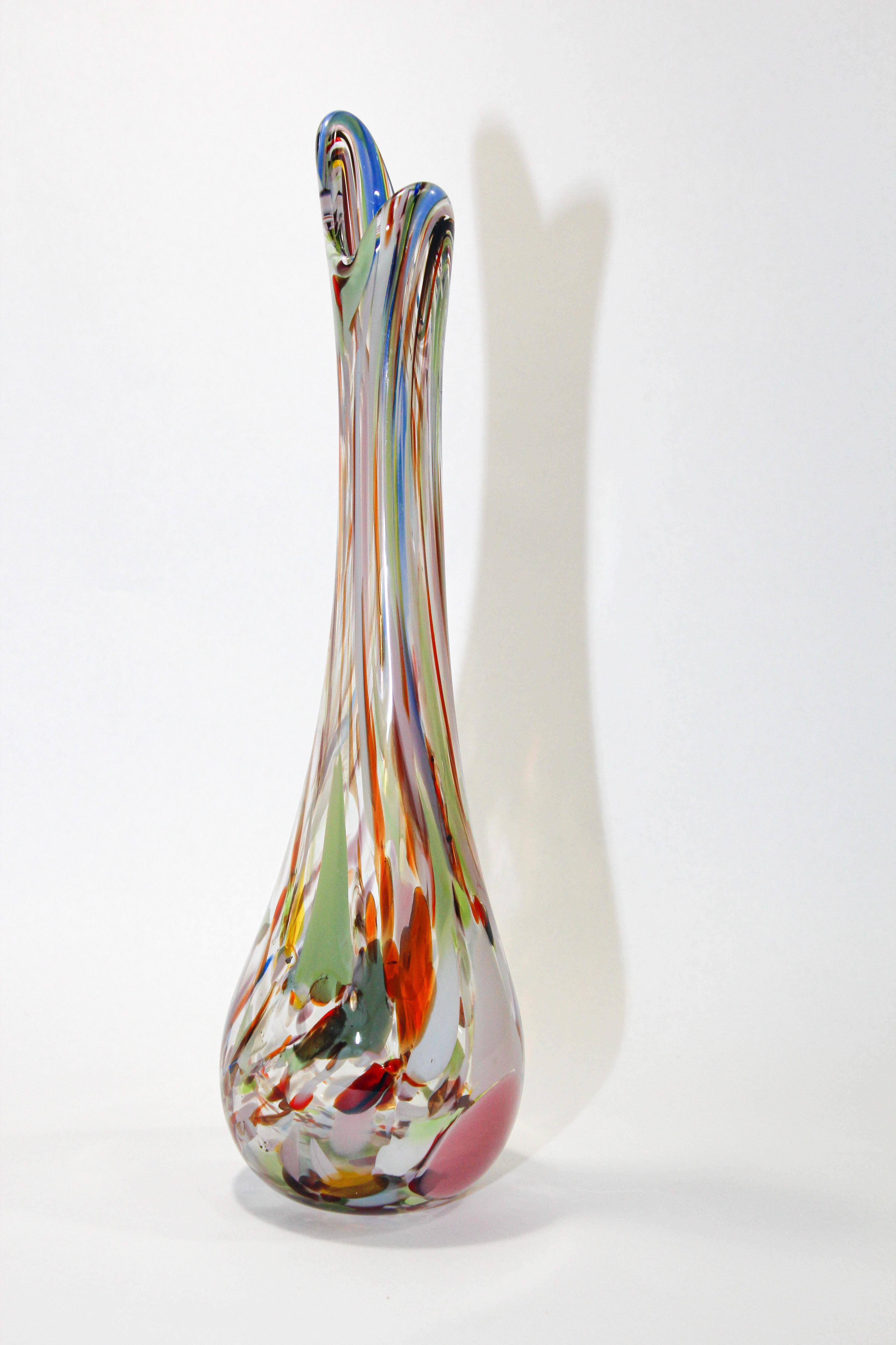 Vintage Murano Venetian handblown art glass vase in multicolored hues.
Hand-made with the technique of glass blowing and Murrina decoration. 
A beautiful organic elegant vase with an interesting original shape, Classic Venetian Murano style