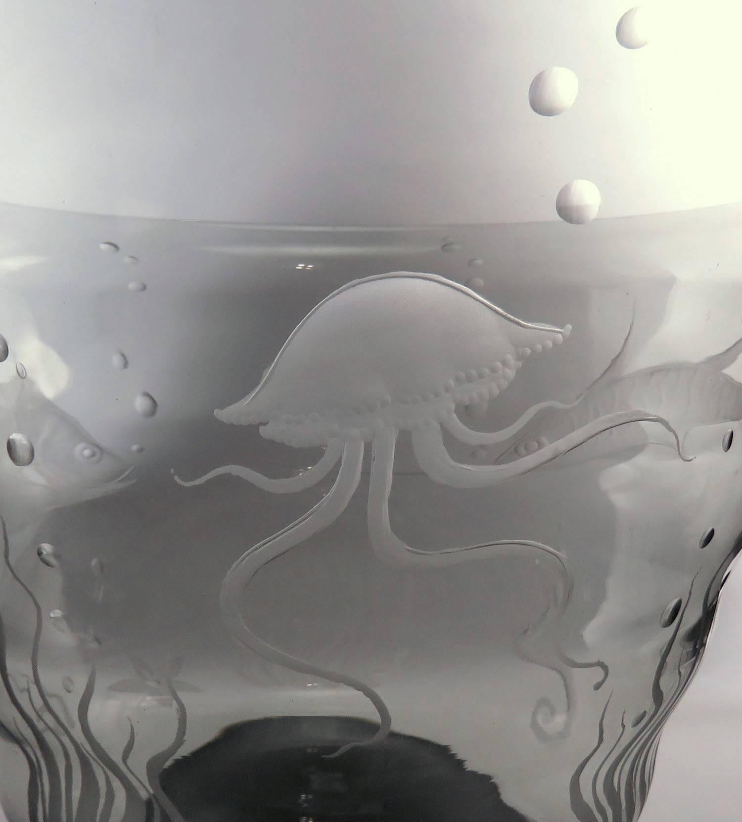 Rare and large handblown Murano glass centerpiece bowl engraved with images of various undersea creatures. Signed Gino Francesconi, and dated 1939. Along with Guglielmo Barbini and Giuseppe D'Alpaos, Francesconi was a founding member of S.A.L.I.R.
