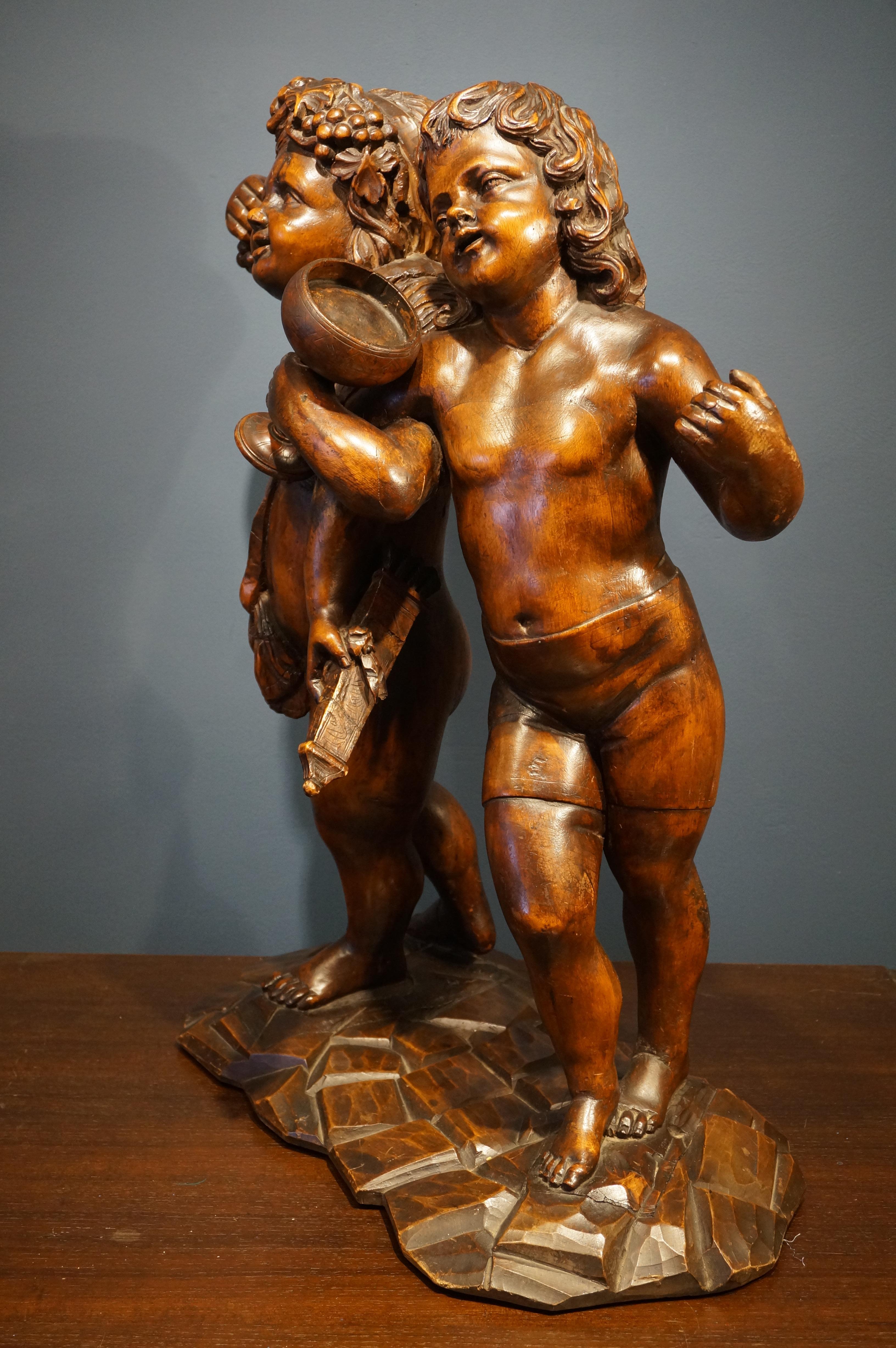 Handcarved baroque wooden sculpture depicting Bacchus and Amor, 18th century For Sale 3