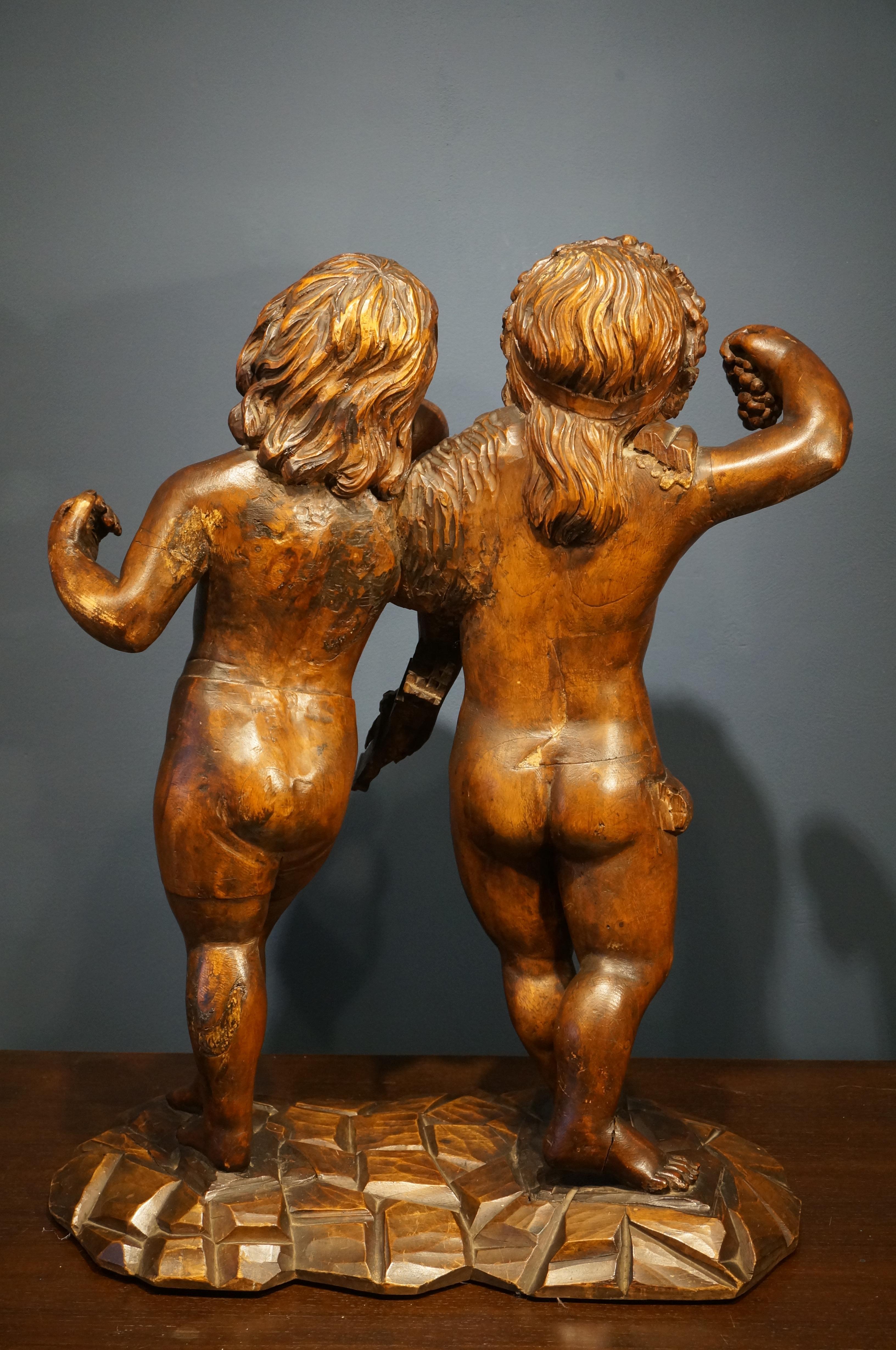 Handcarved baroque wooden sculpture depicting Bacchus and Amor, 18th century For Sale 5