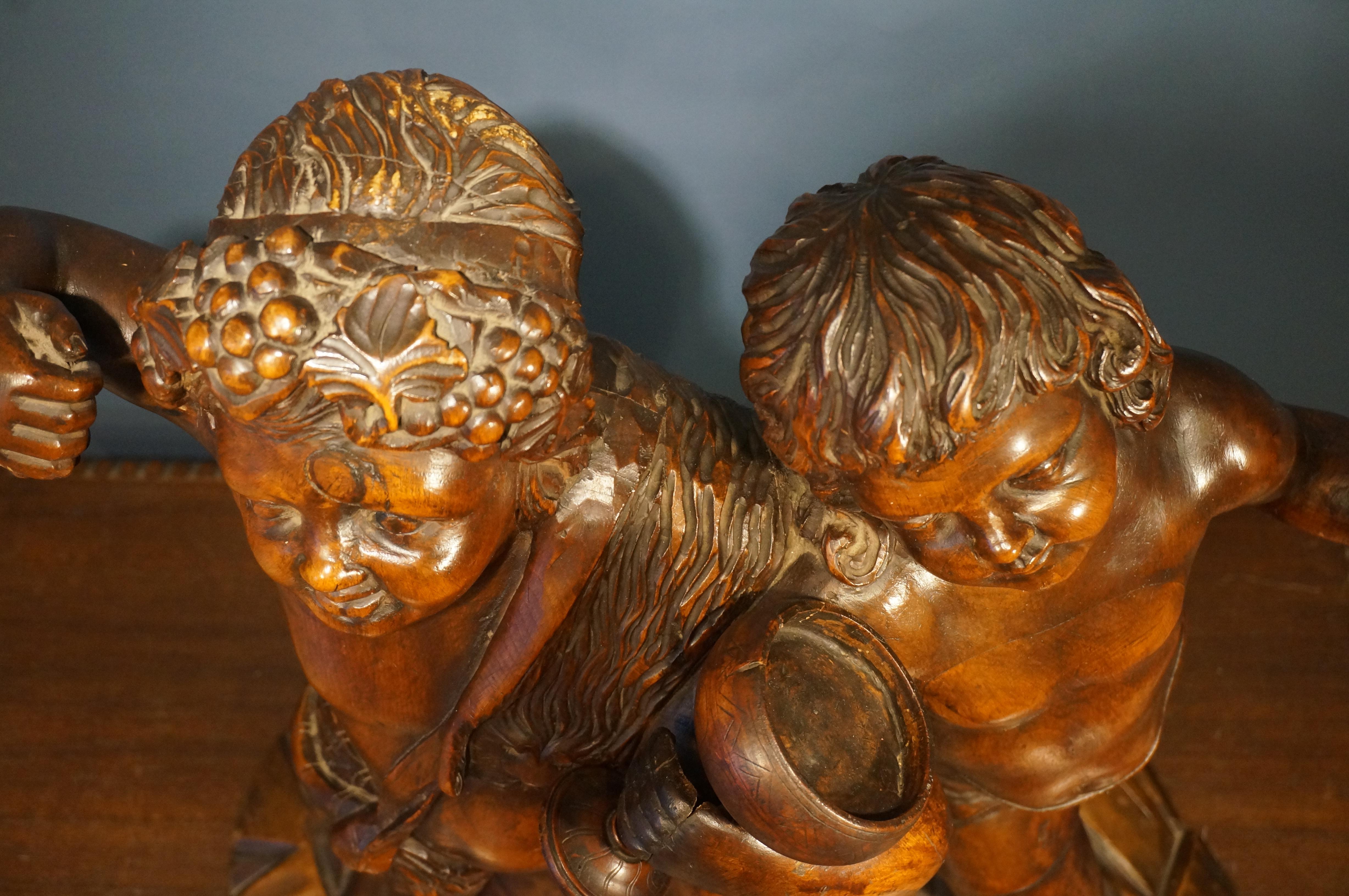 Handcarved baroque wooden sculpture depicting Bacchus and Amor, 18th century For Sale 6