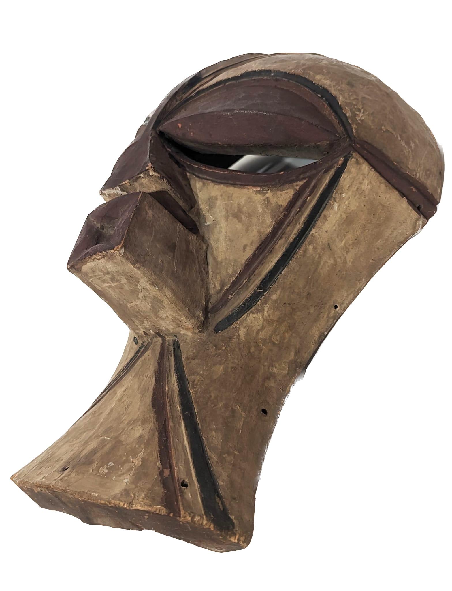 20th Century Handcarved Beninese Tribal Mask For Sale