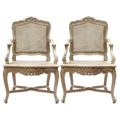 Handcarved & Caned Italian Blonde Armchairs; a pair