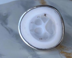 Handcarved wolf paw cacholong silver ring