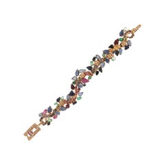 Handgefertigtes Manschettenarmband aus 14 Karat Gelbgold mit Diamanten und Edelsteinen