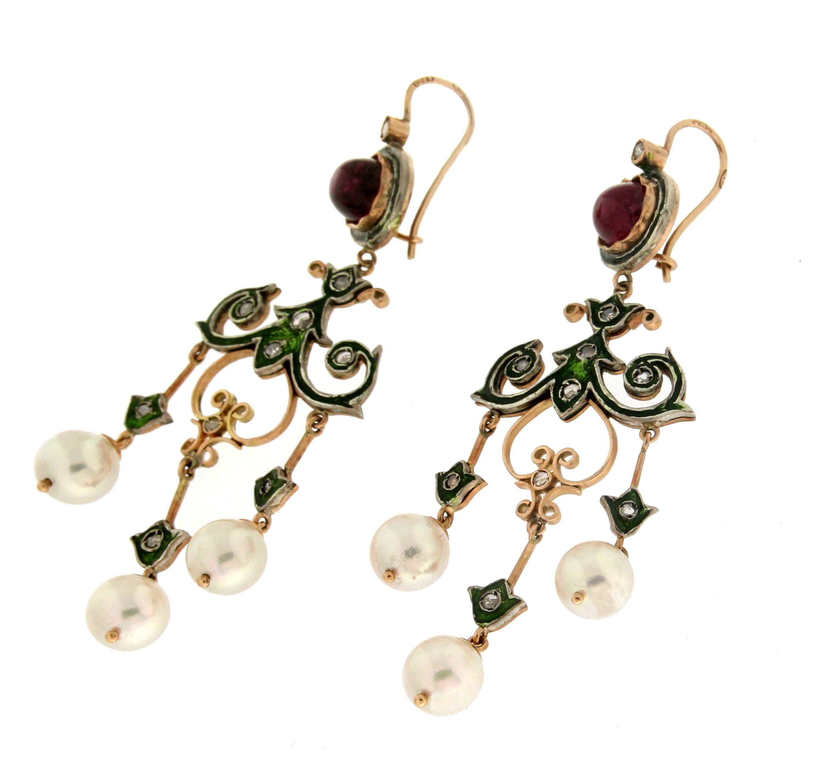 14 karat yellow gold drop earrings. Handmade by artisans and assembled with tourmaline,pearls and diamonds.

Tourmaline weight 5.88 karat
Diamonds weight 0.35 karat
Pearls size 8 mm
Earrings total weight 17.70 grams